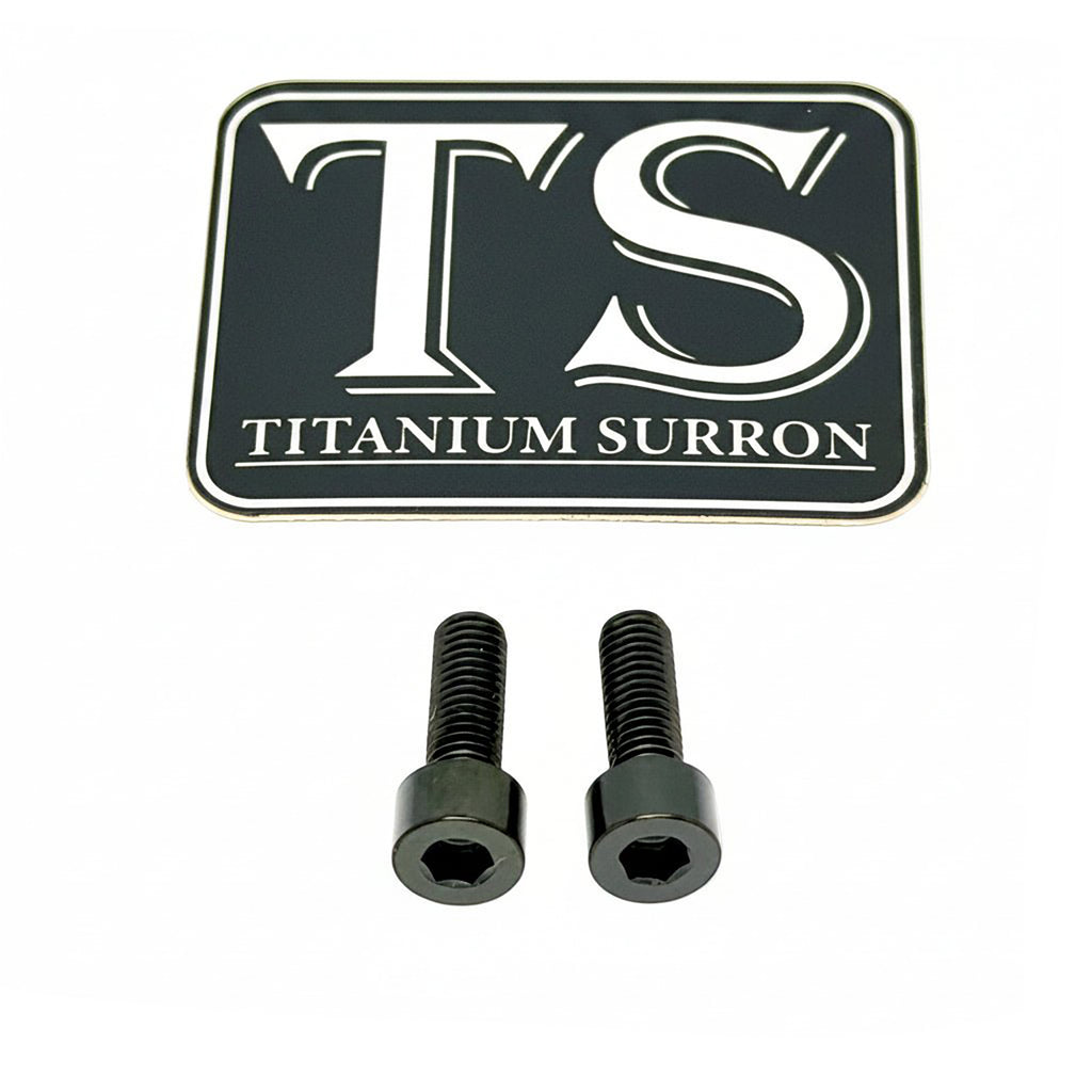A black rectangular badge with white 'TS' lettering and 'TITANIUM SURRON' text, shown above two black hex-head screws on a white background.