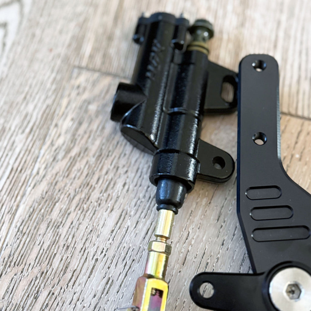 Sur-Ron and E-Ride foot brake kit with Ultra Bee calipers - alternate angle