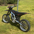 Sur-Ron Ultra Bee 17-inch supermoto wheel set in black and chrome finish