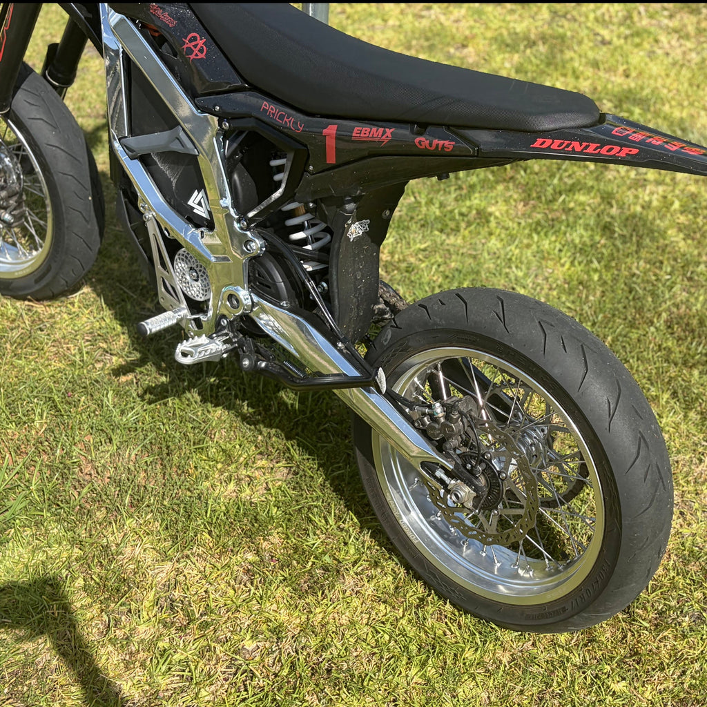 Sur-Ron Ultra Bee 17-inch supermoto wheel set in black and chrome finish - alternate angle