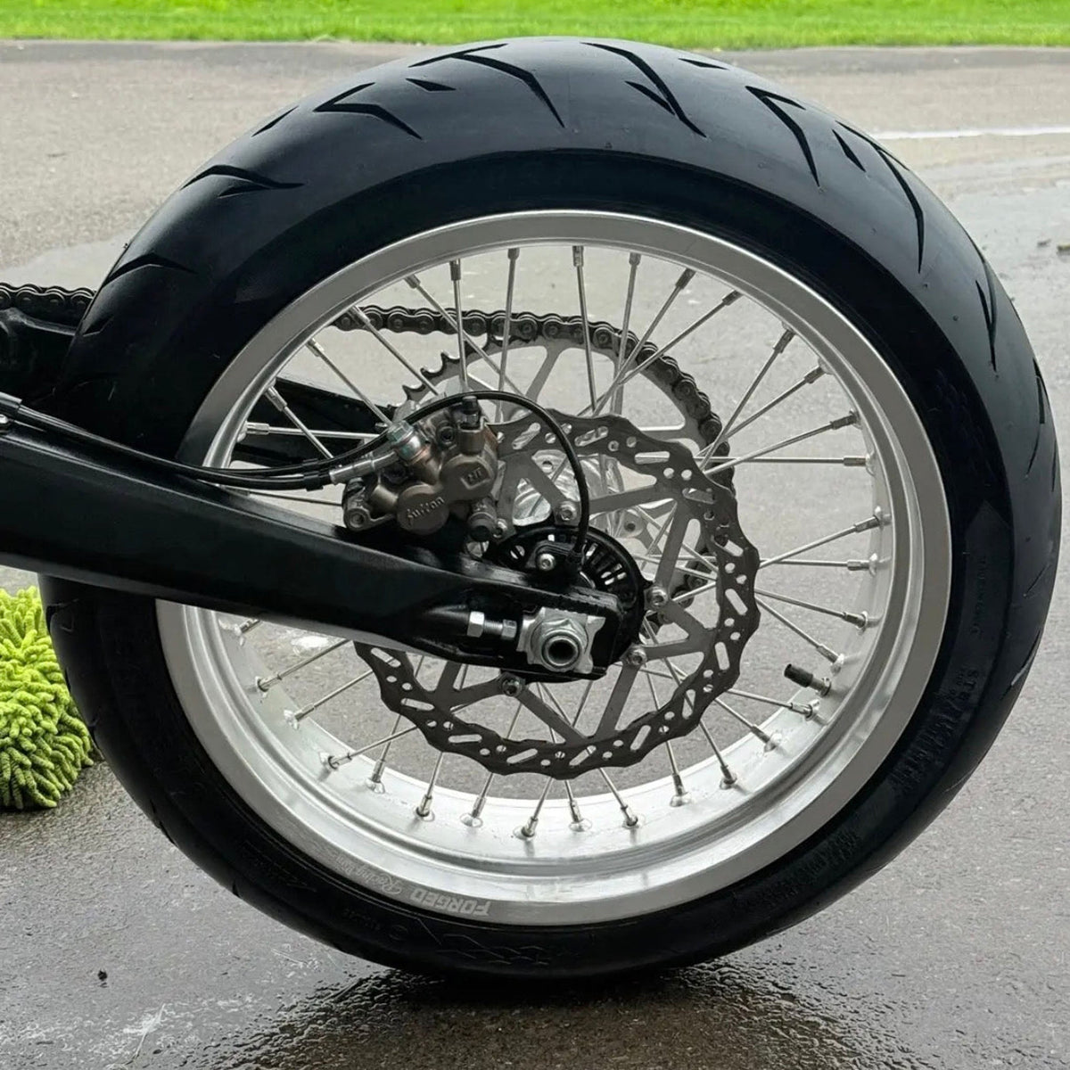 Sur-Ron Ultra Bee 17-inch supermoto wheel set in black and chrome finish - different angle