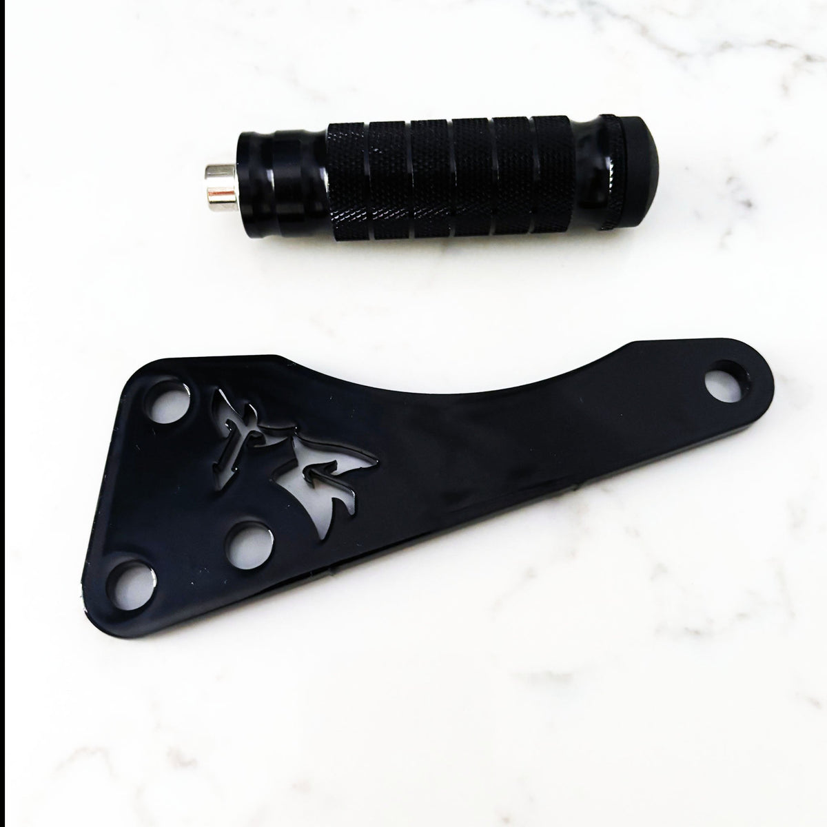 Talaria X3 shift lock and footlock bracket set - close-up detail