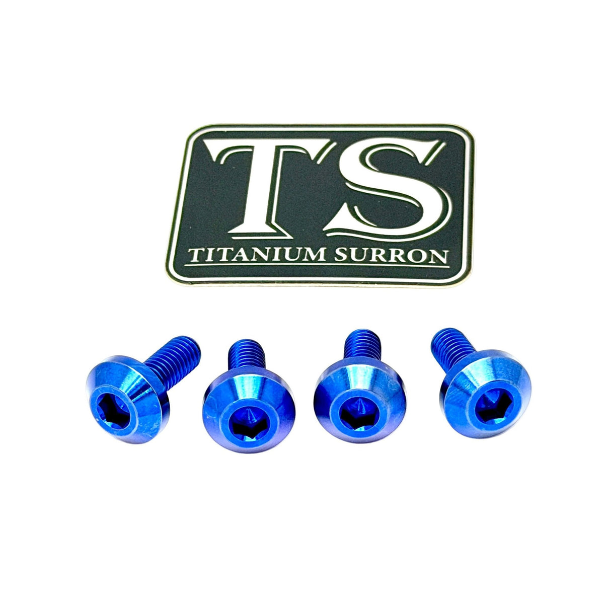 Four metallic blue hex head screws arranged in a row below a black and white 'TS Titanium Surron' logo badge on a plain white background.