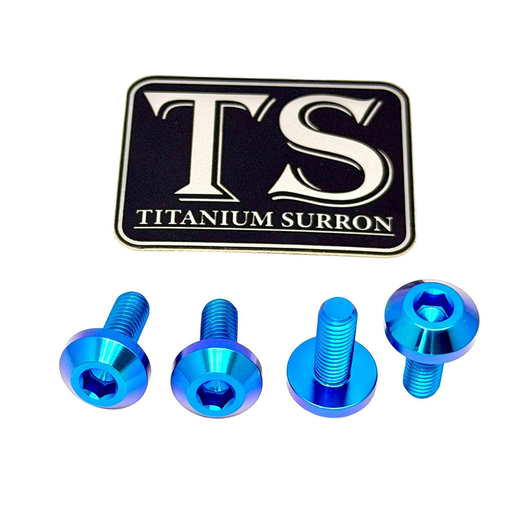 Four metallic blue titanium surron screws displayed below a black and silver 'TS TITANIUM SURRON' logo badge on a plain white background.