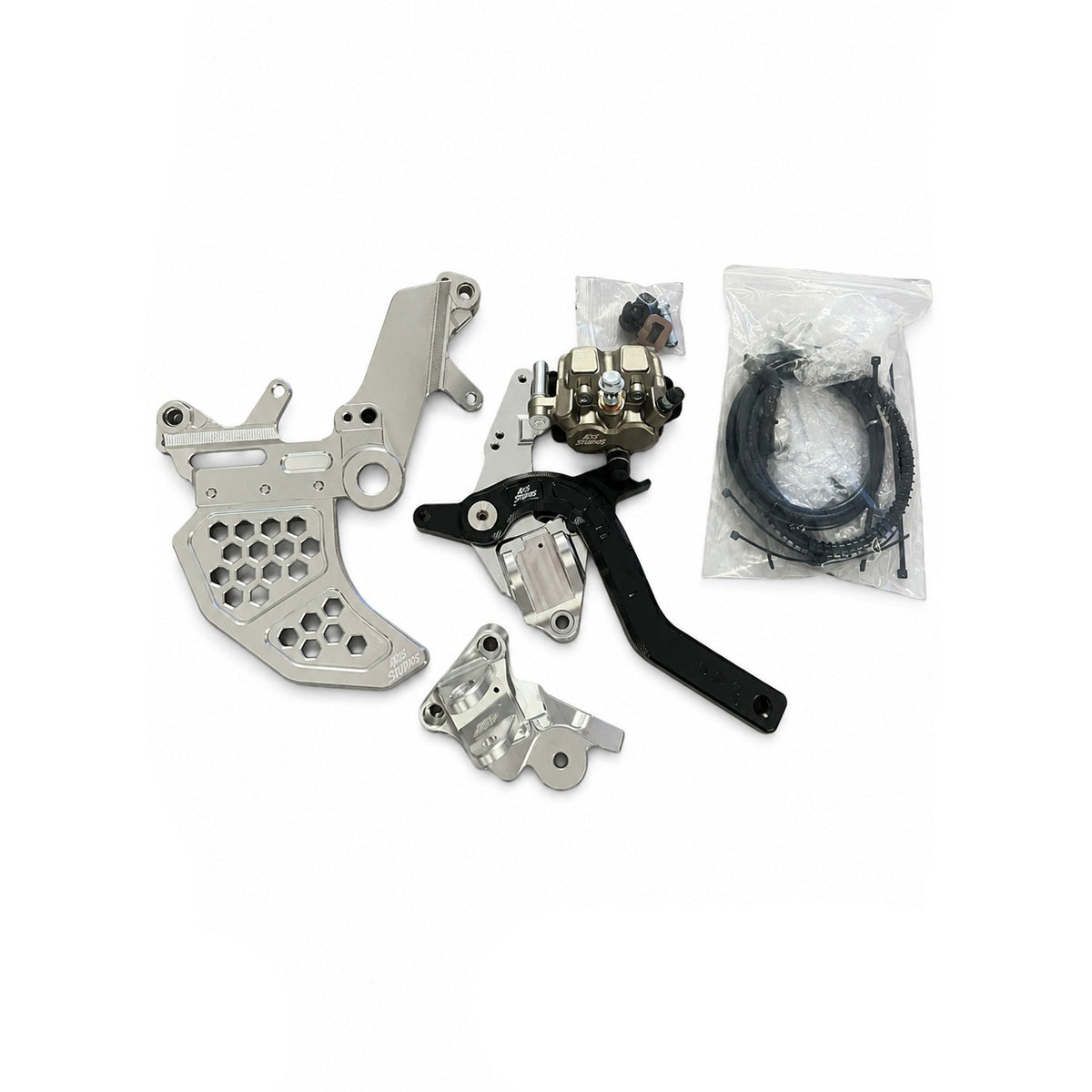 A set of motorcycle or bicycle mechanical parts and accessories laid out on a white background, including silver metal brackets, a black handlebar lever, a small metal component, and a clear plastic bag containing black cables. The AXIS logo is visible in the bottom right corner.
